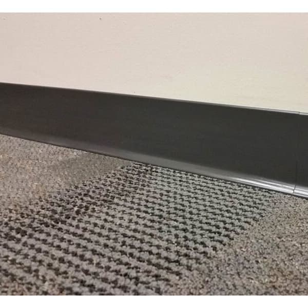 Duracove 2.5" x 3.2mm rubber wall base, gray — installed along wall meeting textured carpet