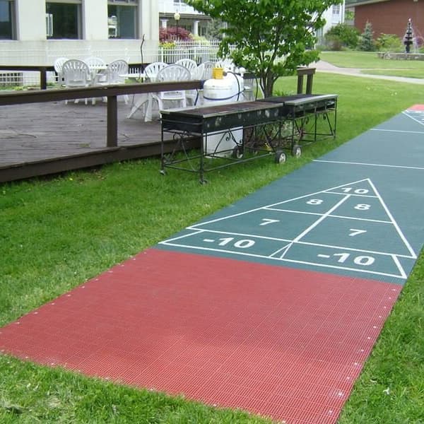 Premium Shuffleboard Court Kit, Sport Green — outdoor shuffleboard court with red and green polypropylene playing surface on
