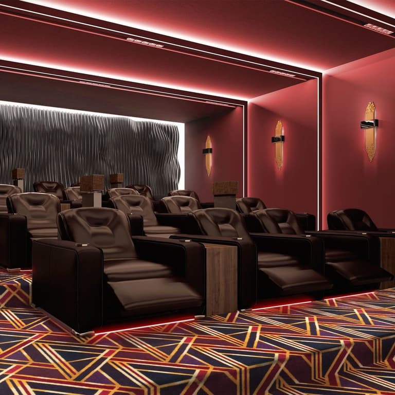 Joy Carpets Moderne Carpet, Ruby — home theater with geometric patterned carpet on tiered seating
