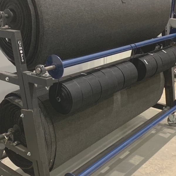 Gym Pro Eco Roll Storage Rack with black rubber flooring rolls