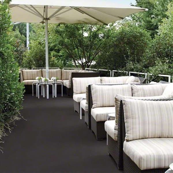 Shaw Outside Agenda Outdoor Carpet in Woodsmoke — patio with outdoor furniture and umbrella, carpet covering the floor
