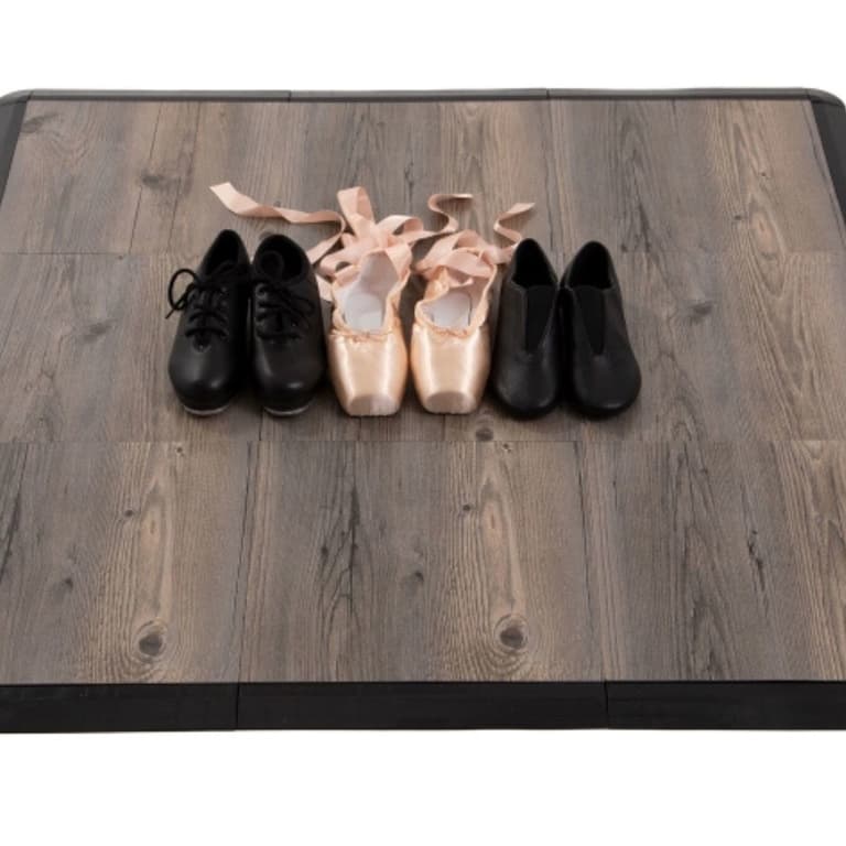 Practice Dance Tile Kit, Barnwood — interlocking dance flooring tiles with black border, featuring ballet and tap shoes