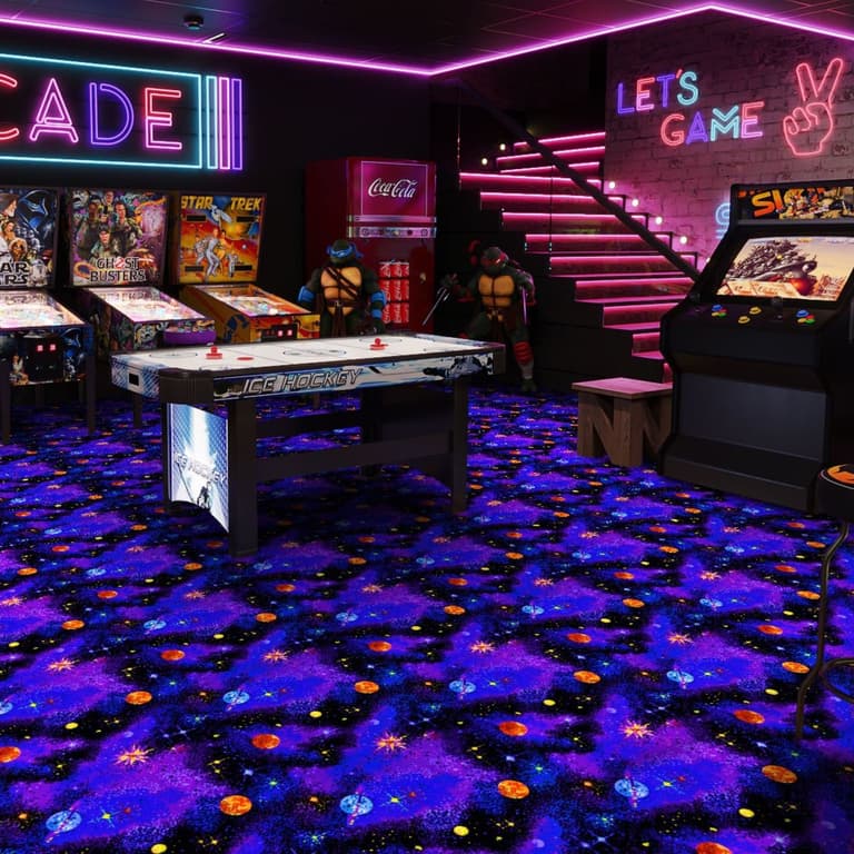 Joy Carpets Neon Lights Carpet — Space Explorer pattern, deep blue carpet with purple galaxy and orange stars, installed in