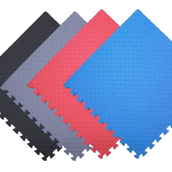 Black, gray, red, and blue soft foam interlocking tiles.
