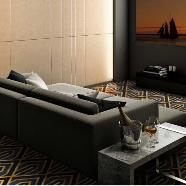 Joy Carpets Pinnacle Carpet, Azure — geometric patterned carpet in a living room
