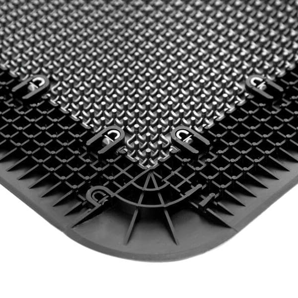HotShot Female Edges court flooring, Graphite — close-up of interlocking polypropylene tile corner with textured surface and