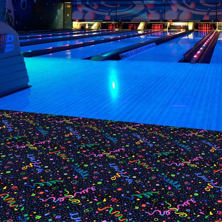 Joy Carpets Neon Lights Carpet — Celebration, nylon carpet roll with confetti and streamer pattern