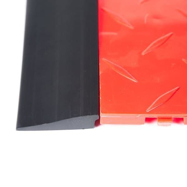 Rubber floor ramps in red and black.