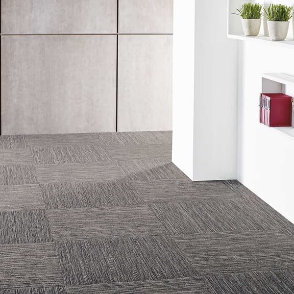Shaw Intellect Carpet Tile, Scholarly — office space with gray textured carpet tiles in a staggered layout