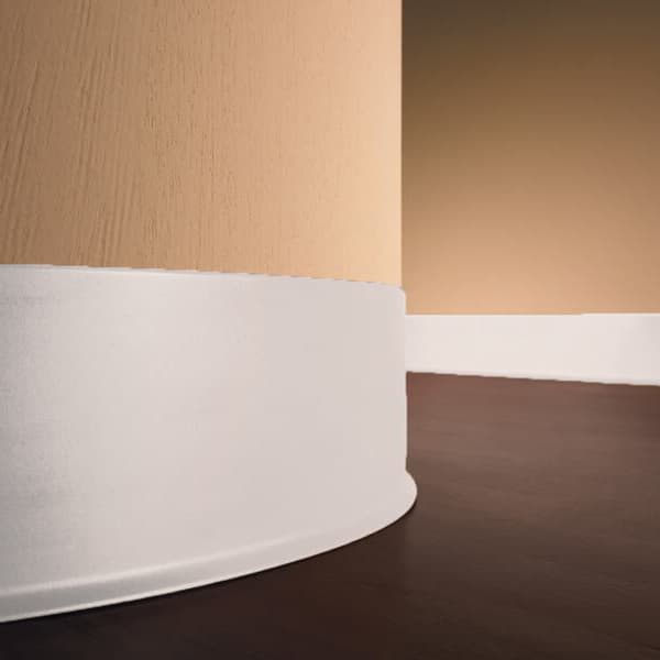 Pinnacle 1/8" x 120' Rubber Wall Base — white thermoset rubber trim installed at base of wall, curved corner detail