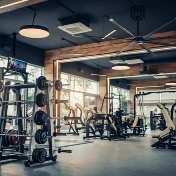 Rubber floor tiles in black in commercial gym.