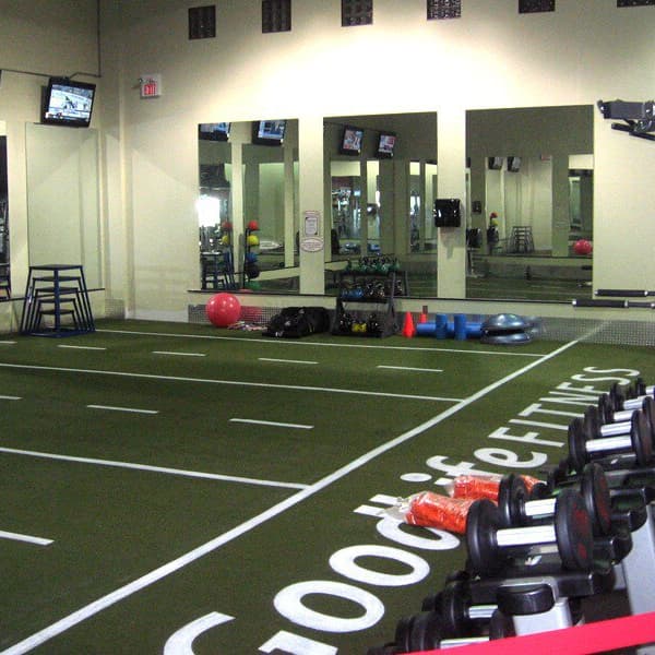 Artificial turf tiles in an indoor gym.
