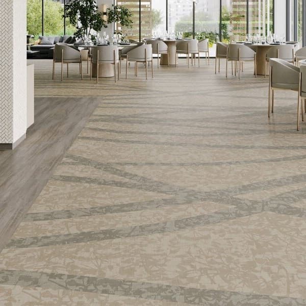 Mannington Wildflower 6' Vinyl Sheet in Tranquility — beige and gray abstract pattern, installed in a restaurant