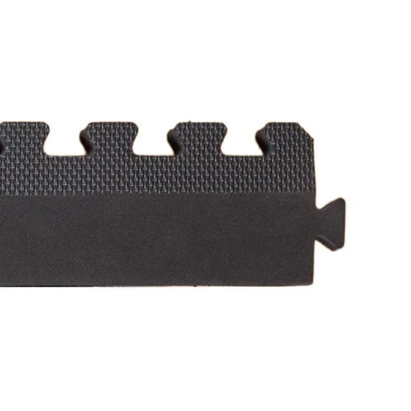 MMA Female Edge foam tile, black — close-up of interlocking edge with textured surface