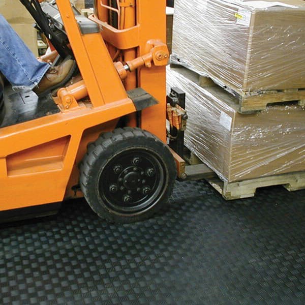 Black diamond flex tiles in warehouse.