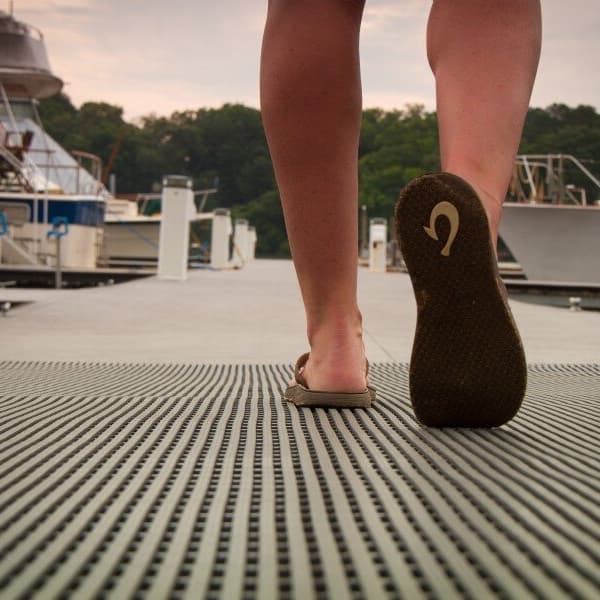 Plastex Heronair Drainage Mats, gray — textured PVC mat on a marina dock
