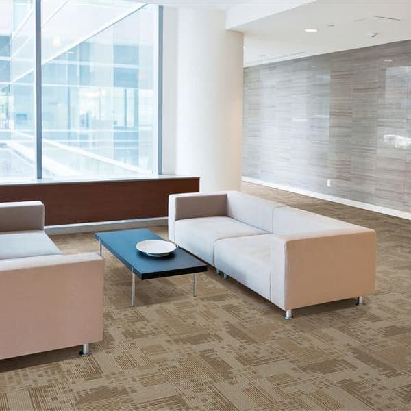 Mohawk Set In Motion Carpet Tile, Atmosphere — modern office lounge with beige and brown geometric pattern carpet