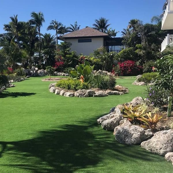 Garden with Riviera Turf Rolls in Lime/Emerald Green artificial grass