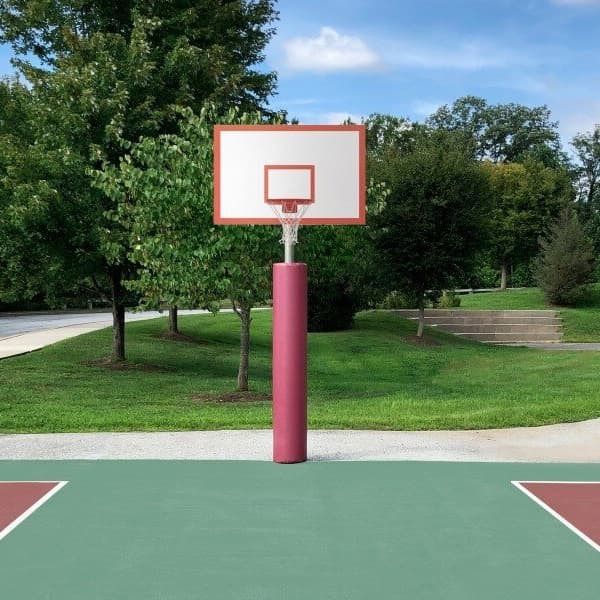 Pink Premium 6' Pole Padding on a basketball hoop pole, outdoor court setting