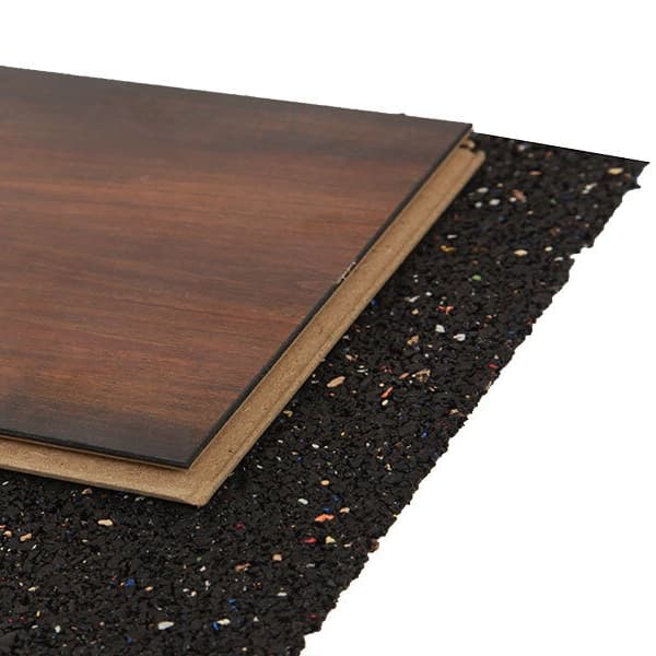 Black pre-cut rubber underlayment under wood plank.