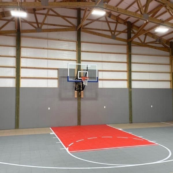 Indoor basketball court kit with Victory Red key area and gray flooring