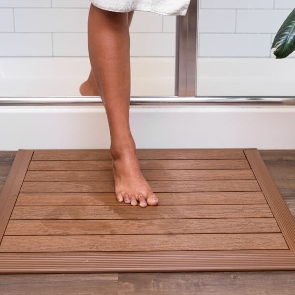 NewTechWood Composite Shower Tiles, Peruvian Teak — bathroom floor mat with wooden texture