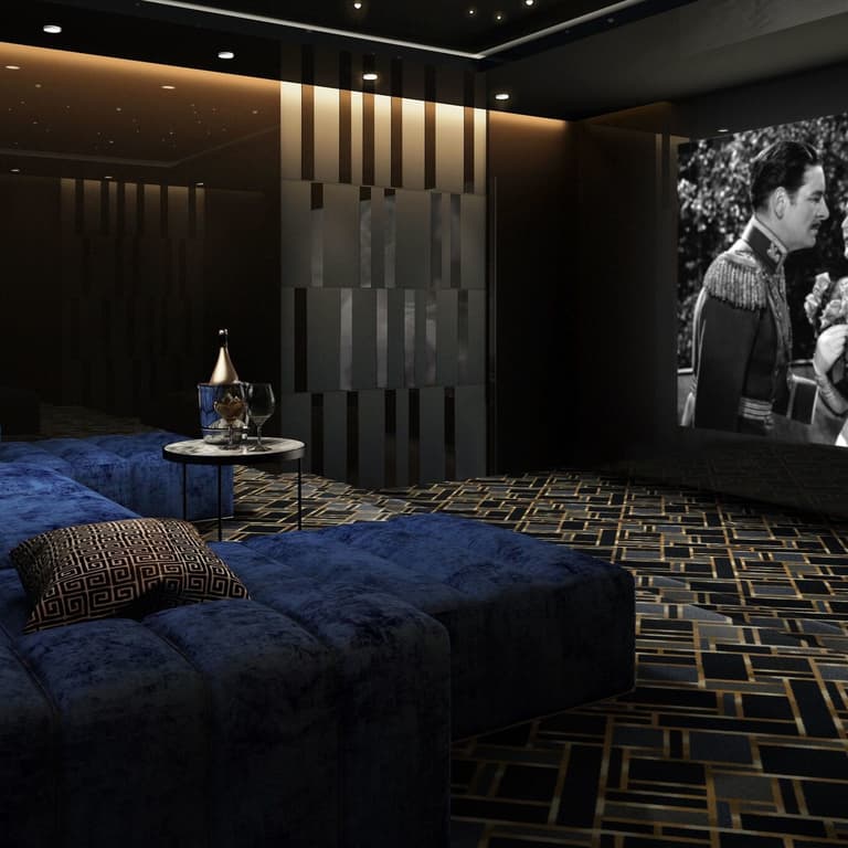 Home theater with Gatsby carpet in Azure, featuring a geometric black and gold pattern