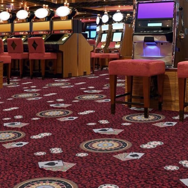 Joy Carpets Inside Bet Carpet, burgundy with roulette wheel and playing card pattern