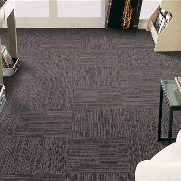 Mohawk Get Moving Carpet Tile, Graphite — music room with carpet tiles under record shelves and turntable