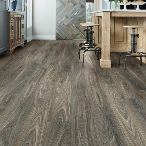 Shaw Anvil Plus 20 rigid core vinyl planks in Gray Chestnut — kitchen with island and bar stools, wood-look flooring